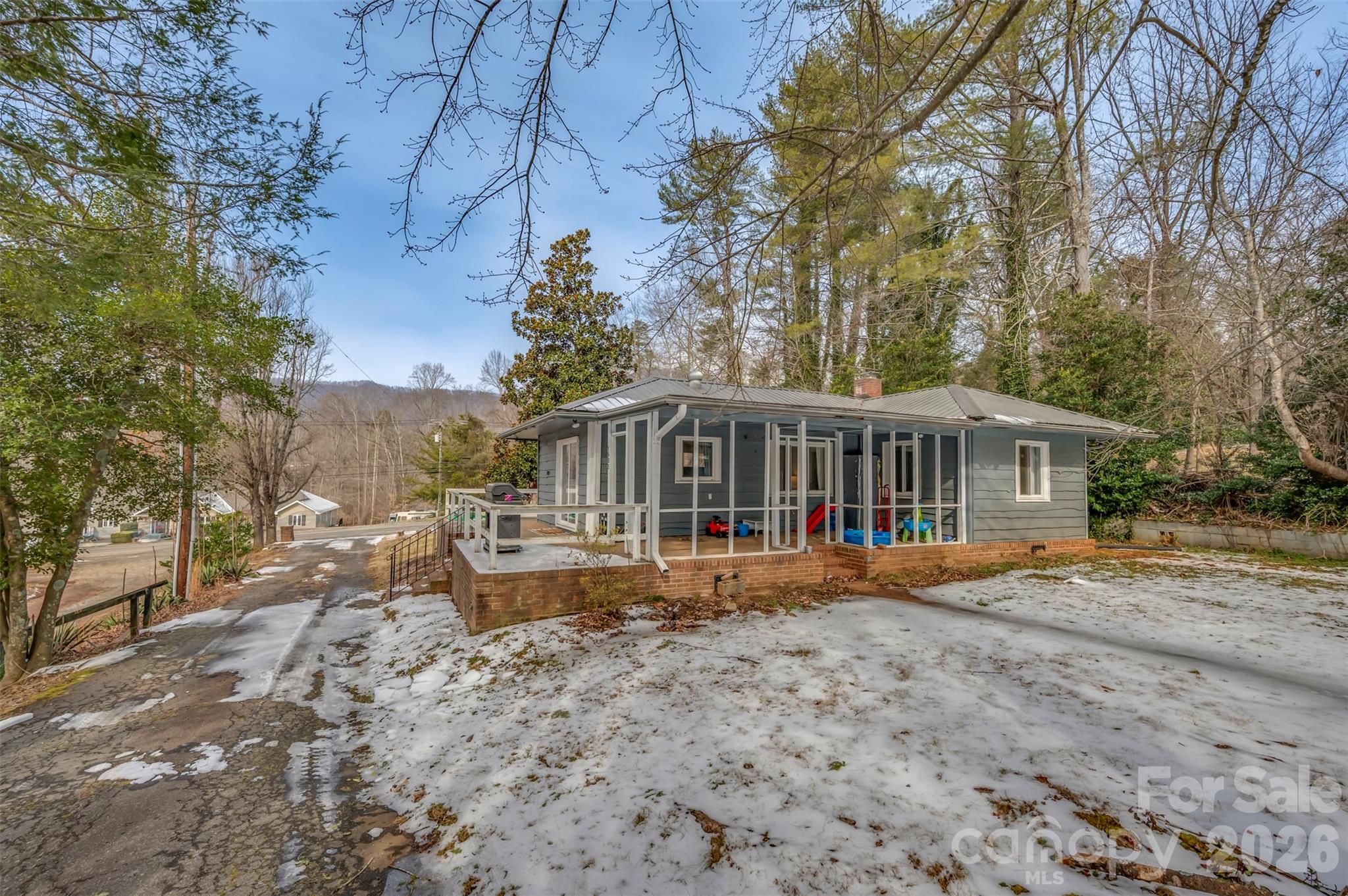 1685 Lynn Road Columbus, NC 28722 - Photo 30 of 31 a view of a house with a yard