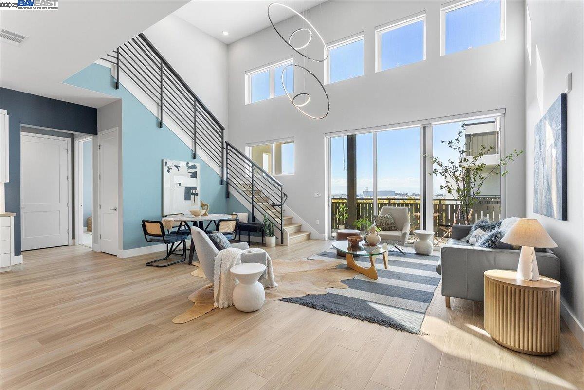 2250 Kilowatt Way, Unit 409 Fremont, CA 94539 - Photo 1 of 1 a living room with furniture and a large window