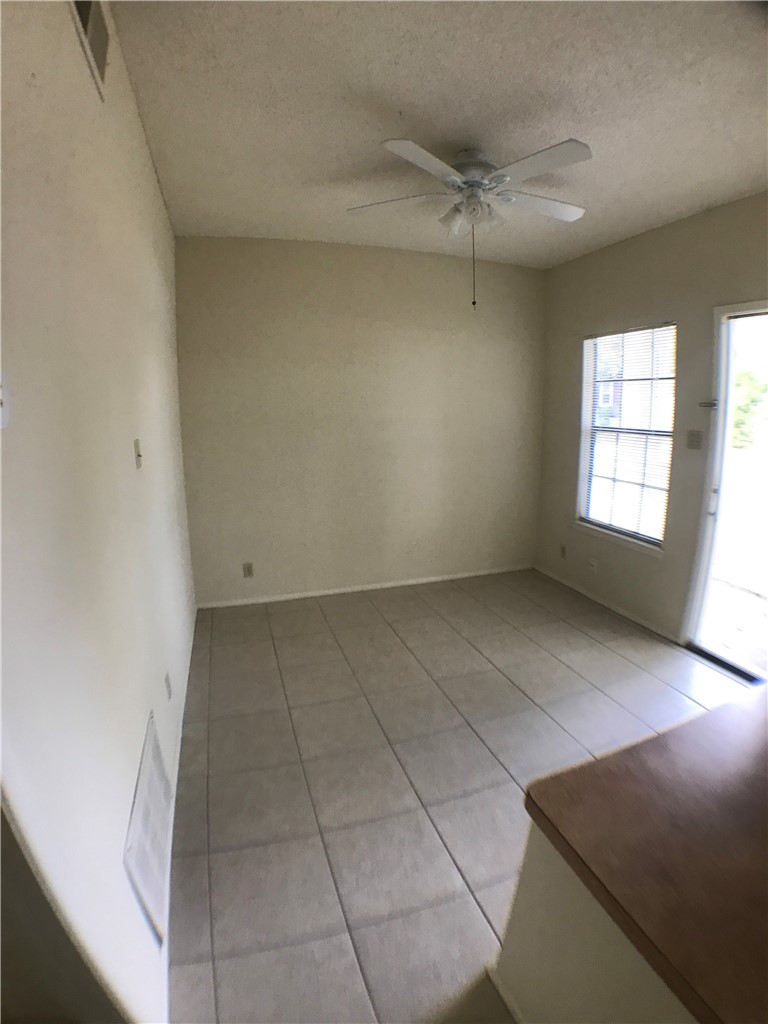 619 West 37th Street, Unit 101 Austin, TX 78705 - Photo 5 of 14 an empty room with windows