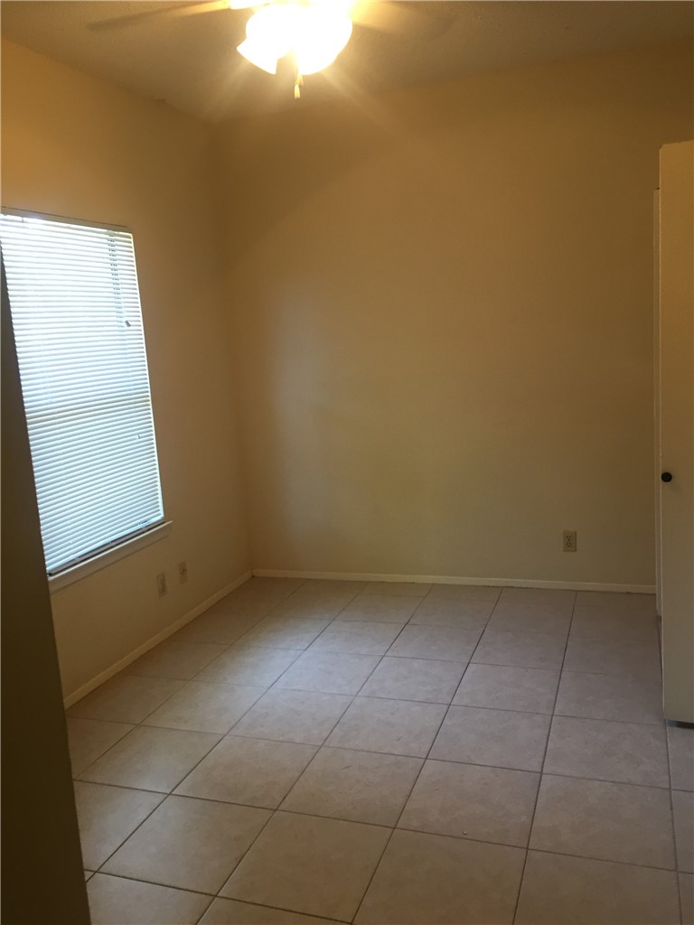 619 West 37th Street, Unit 101 Austin, TX 78705 - Photo 9 of 14 a view of room with window