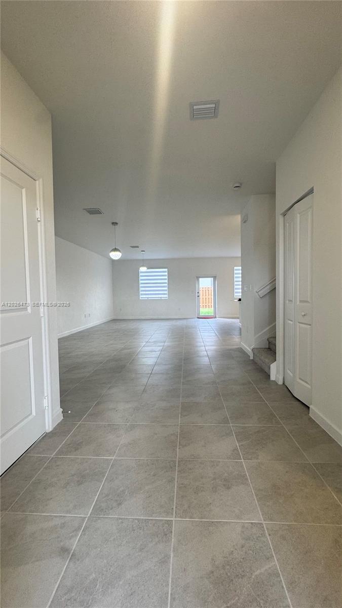 19479 Southwest 340th Street, Unit 1 Homestead, FL 33034 - Photo 58 of 58 a view of a hallway