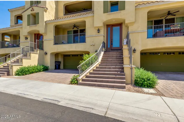 a view of a building with a yard