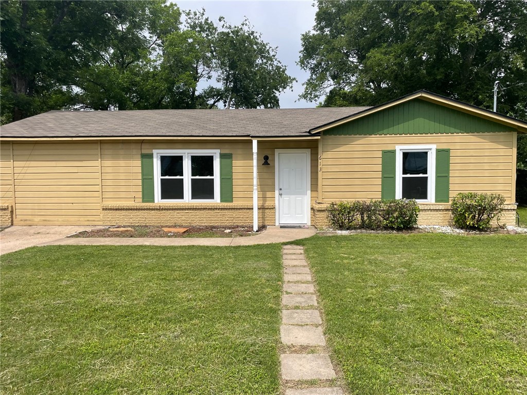613 North Norma Drive Waco, TX 76705 - Photo 1 of 1 a front view of a house with yard