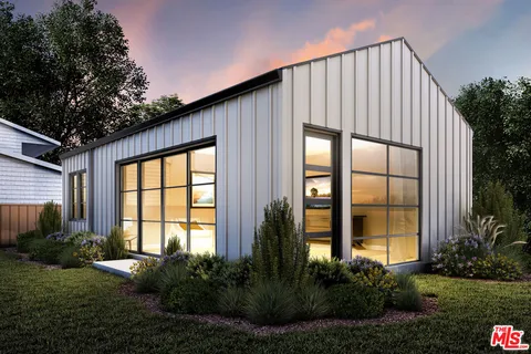 a house view with a garden space