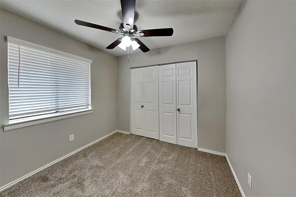 4649 Birchbend Lane Fort Worth, TX 76137 - Photo 11 of 18 a view of an empty room with a window