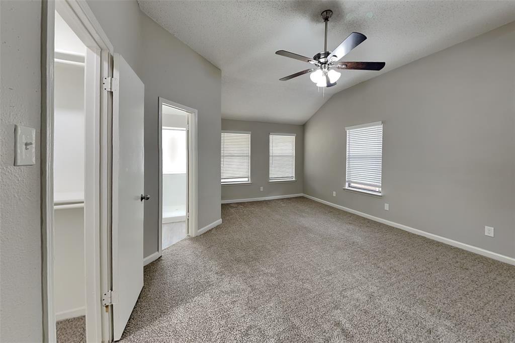 4649 Birchbend Lane Fort Worth, TX 76137 - Photo 7 of 18 a view of a livingroom with a ceiling fan and window