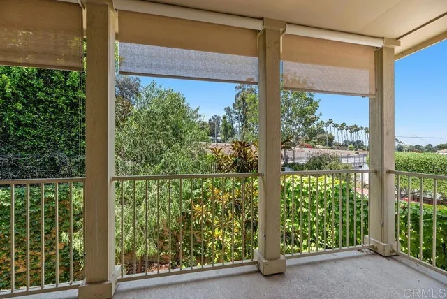 a view of a door and a window