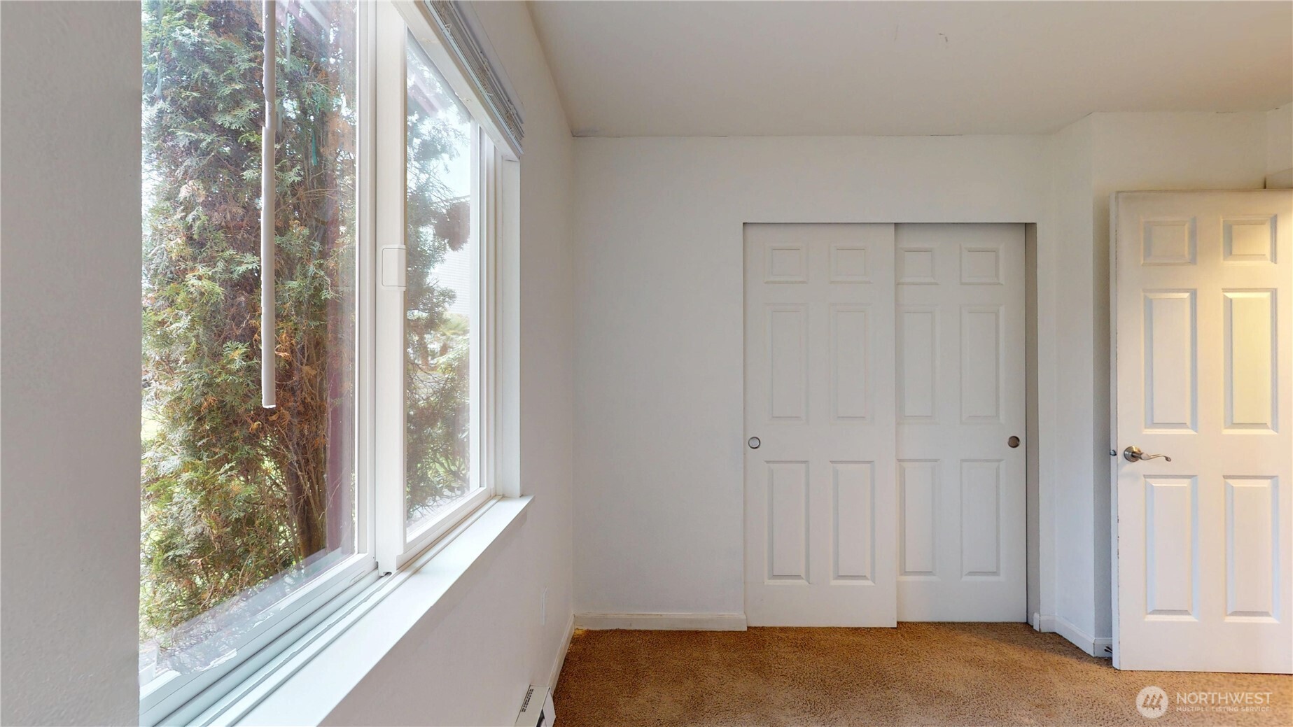 2613 South 272nd Street, Unit 21 Kent, WA 98032 - Photo 12 of 19 a view of bedroom and window