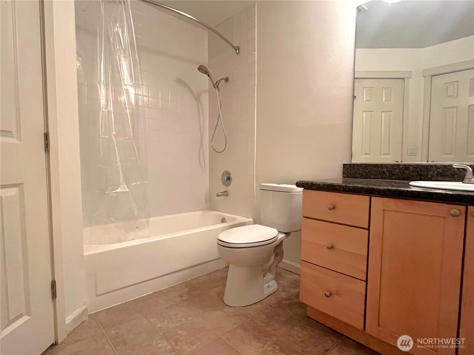 2613 South 272nd Street, Unit 21 Kent, WA 98032 - Photo 16 of 19 a bathroom with a sink a toilet and shower