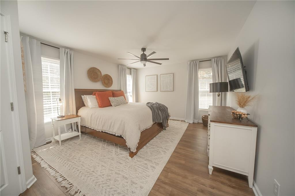 2741 Creek Point Road Graham, NC 27253 - Photo 14 of 36 a bedroom with a bed a window and dresser