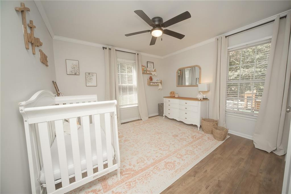 2741 Creek Point Road Graham, NC 27253 - Photo 20 of 36 a bedroom with a bed and a window