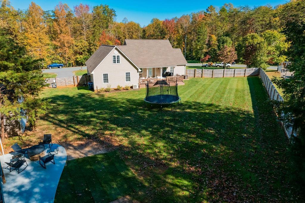 2741 Creek Point Road Graham, NC 27253 - Photo 32 of 36 a view of a house with a yard and sitting area