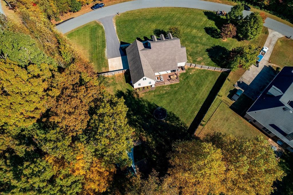 2741 Creek Point Road Graham, NC 27253 - Photo 33 of 36 an aerial view of a house with a yard