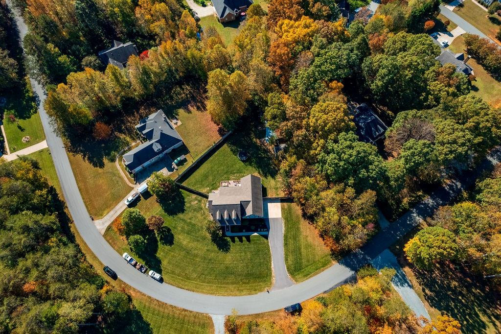 2741 Creek Point Road Graham, NC 27253 - Photo 35 of 36 an aerial view of a house with a yard basket ball court and outdoor seating