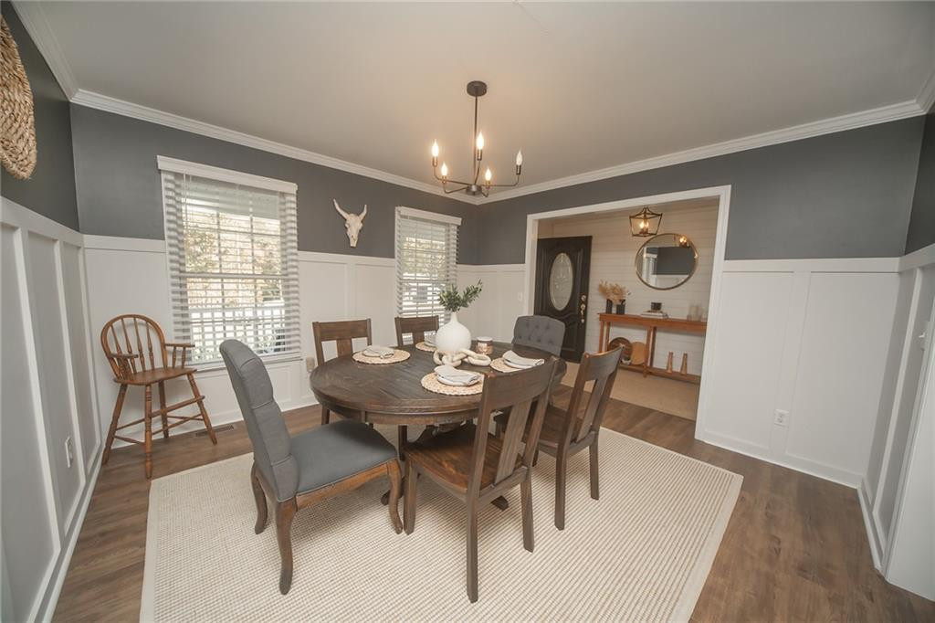 2741 Creek Point Road Graham, NC 27253 - Photo 8 of 36 a view of a dining room with furniture and window