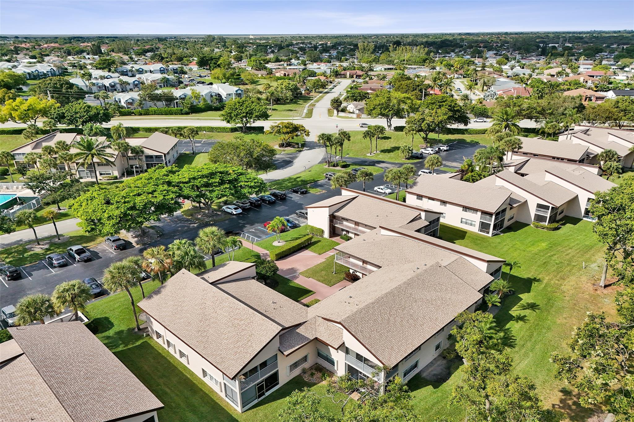 8740 Azalea Court, Unit 102 Tamarac, FL 33321 - Photo 26 of 60 an aerial view of residential houses with outdoor space