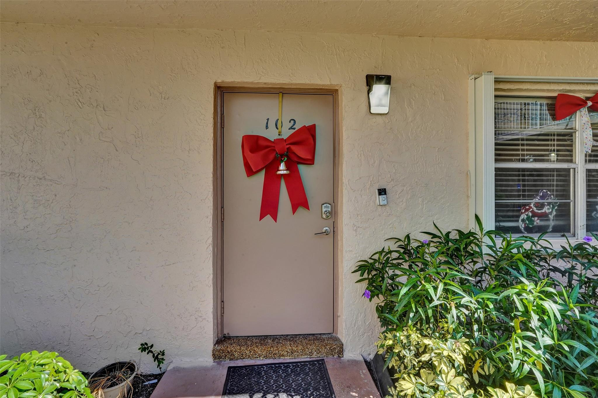 8740 Azalea Court, Unit 102 Tamarac, FL 33321 - Photo 35 of 60 a view of a potted plant on the wall