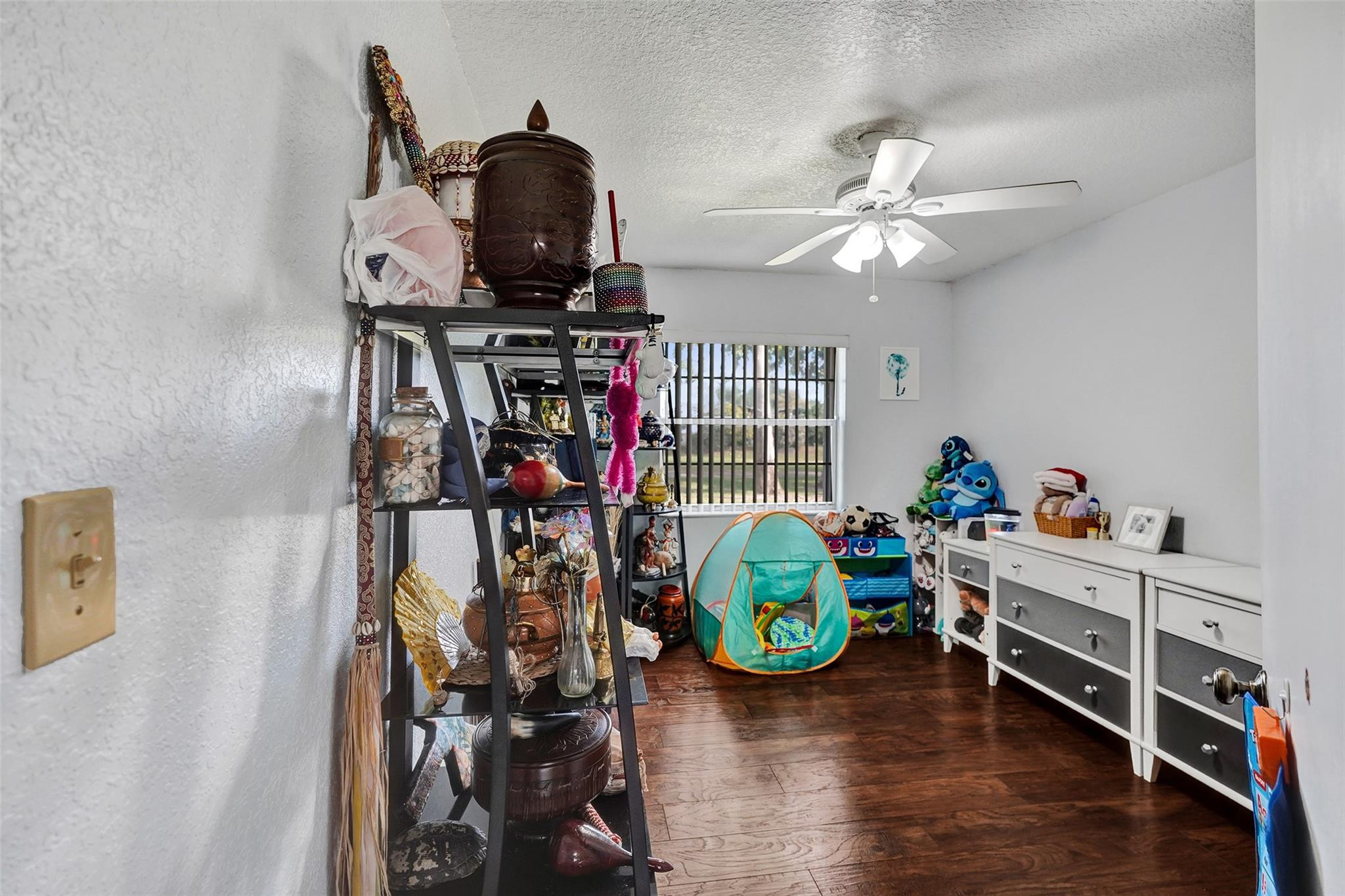 8740 Azalea Court, Unit 102 Tamarac, FL 33321 - Photo 43 of 60 a view of a workspace with furniture and a window