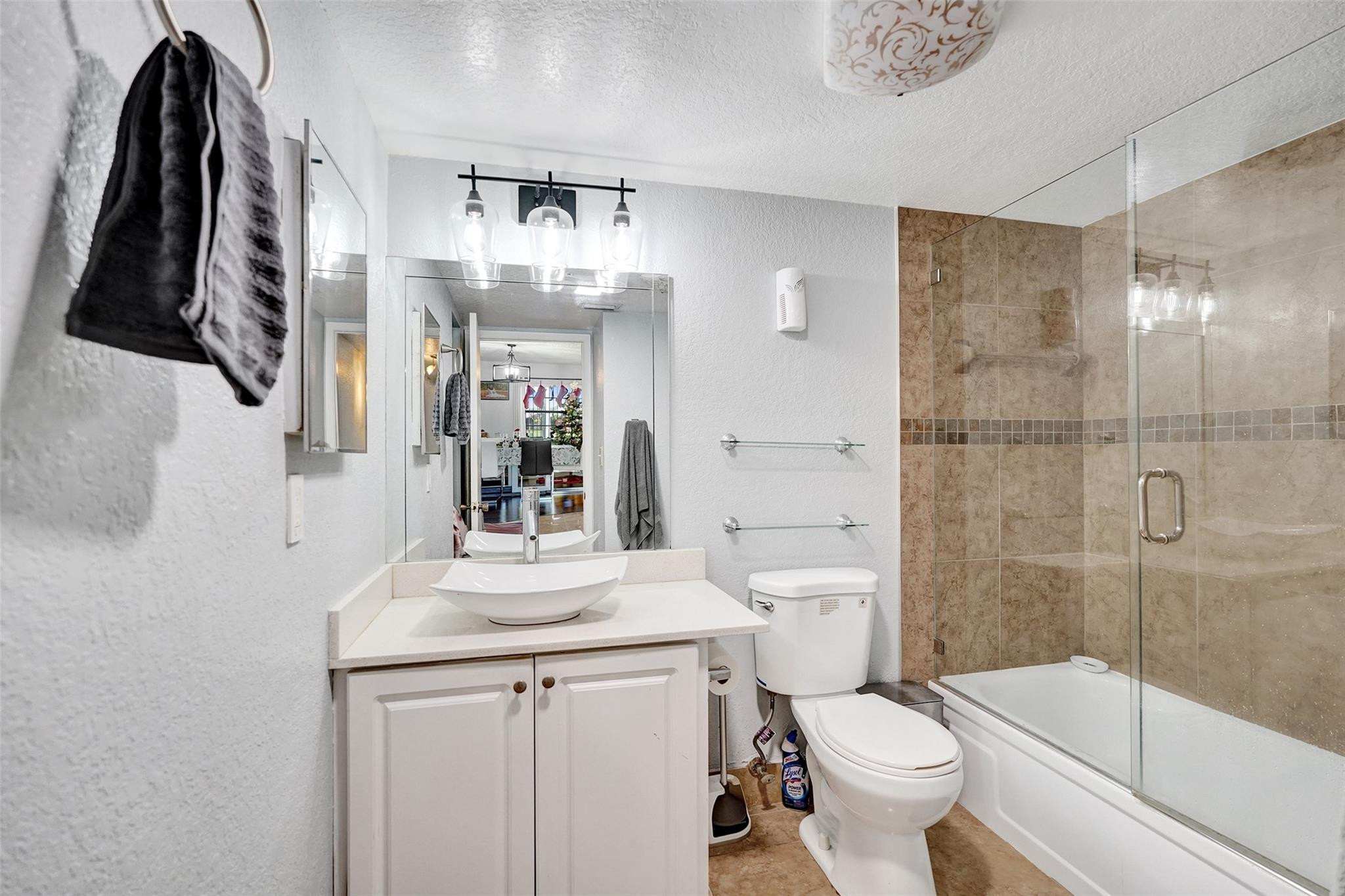 8740 Azalea Court, Unit 102 Tamarac, FL 33321 - Photo 48 of 60 a bathroom with a sink a toilet and shower