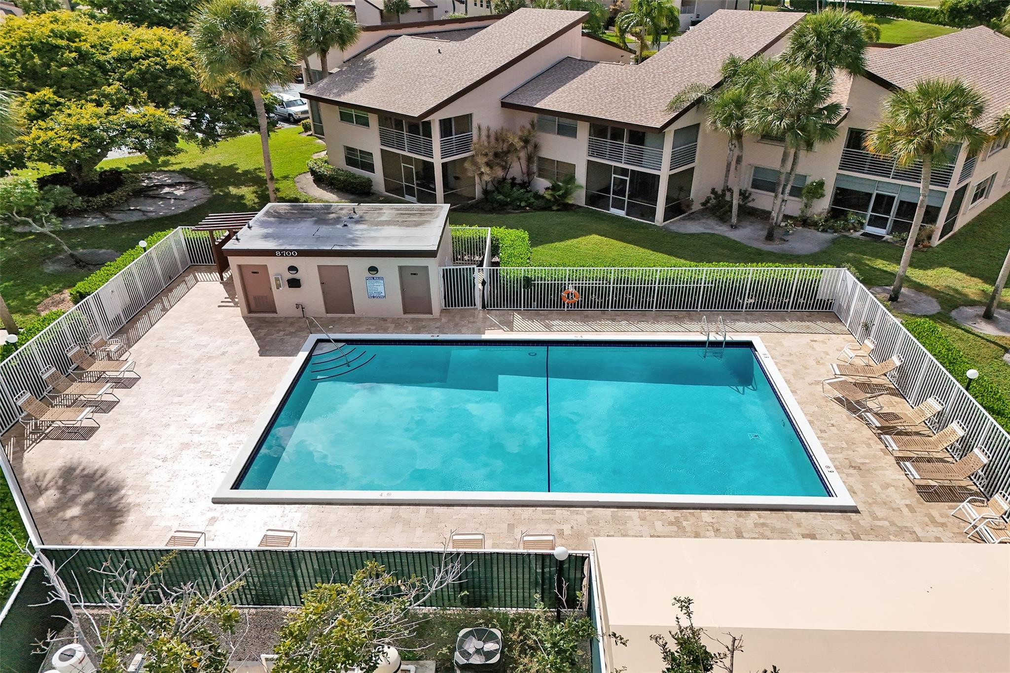 8740 Azalea Court, Unit 102 Tamarac, FL 33321 - Photo 6 of 60 a view of house with garden space and seating area