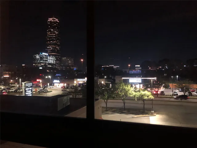 a view of a lake in the night