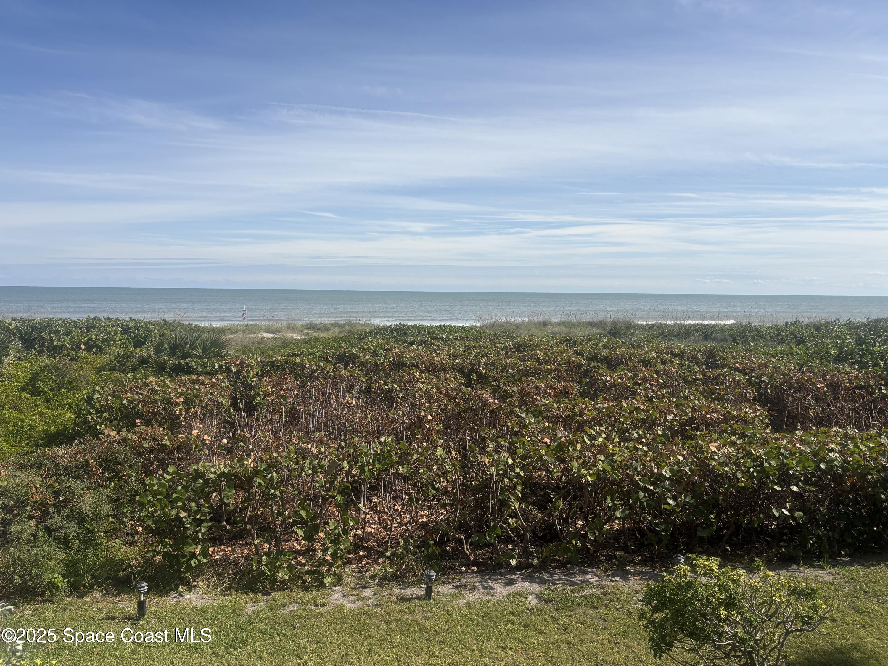 3150 North Atlantic Avenue, Unit 7550 Cocoa Beach, FL 32931 - Photo 1 of 4 a view of city and mountain