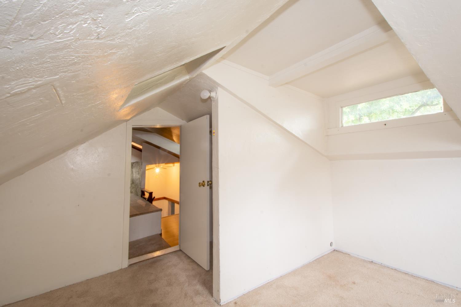 18089 Riverside Drive Sonoma, CA 95476 - Photo 12 of 14 a view of a hallway view with wooden floor and a bathroom