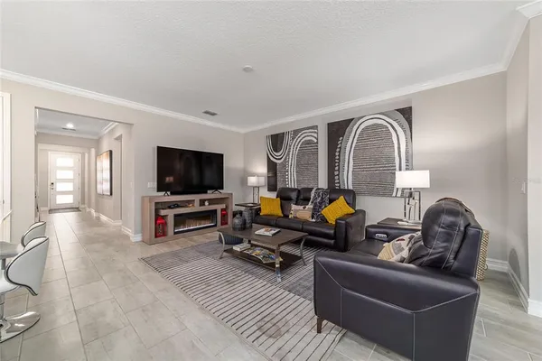 a kitchen with stainless steel appliances a sink stove and cabinets