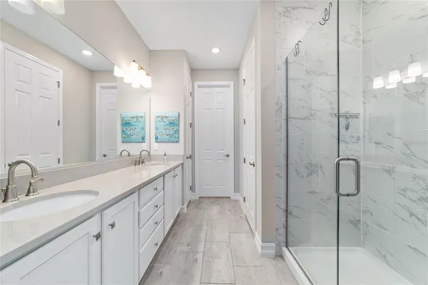 a view of a house with backyard sitting area and garden