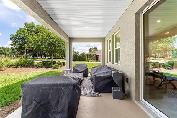 an aerial view of a houses with outdoor space