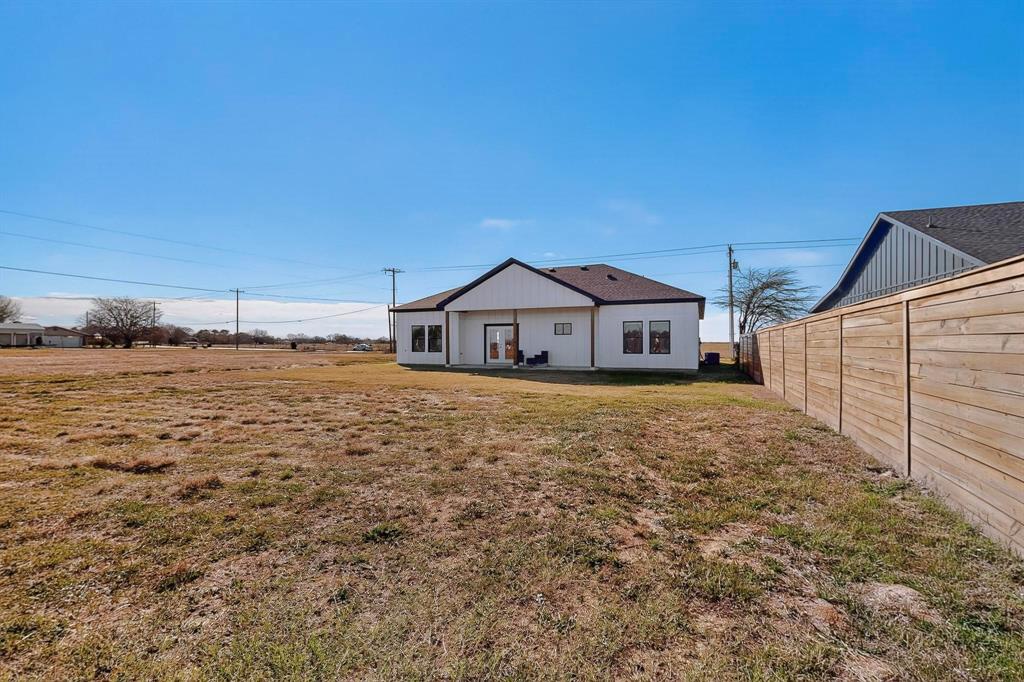 4464 Key Ranch Road Trinidad, TX 75163 - Photo 38 of 40 Back of house with a patio