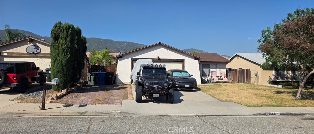 1548 Ranch Road San Bernardino, CA 92407 - Photo 1 of 26 a view of a house with a patio