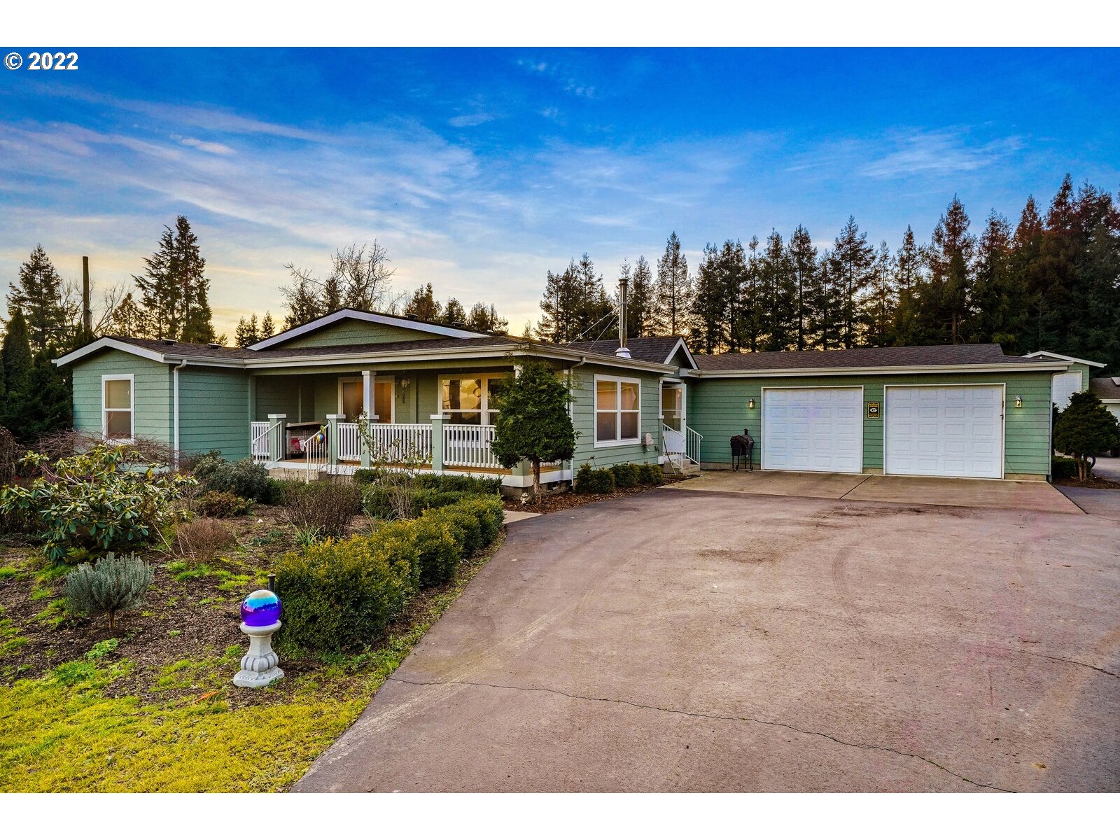 11005 Portland Road Northeast Salem, OR 97305 - Photo 1 of 32 a view of a house with yard and a garden