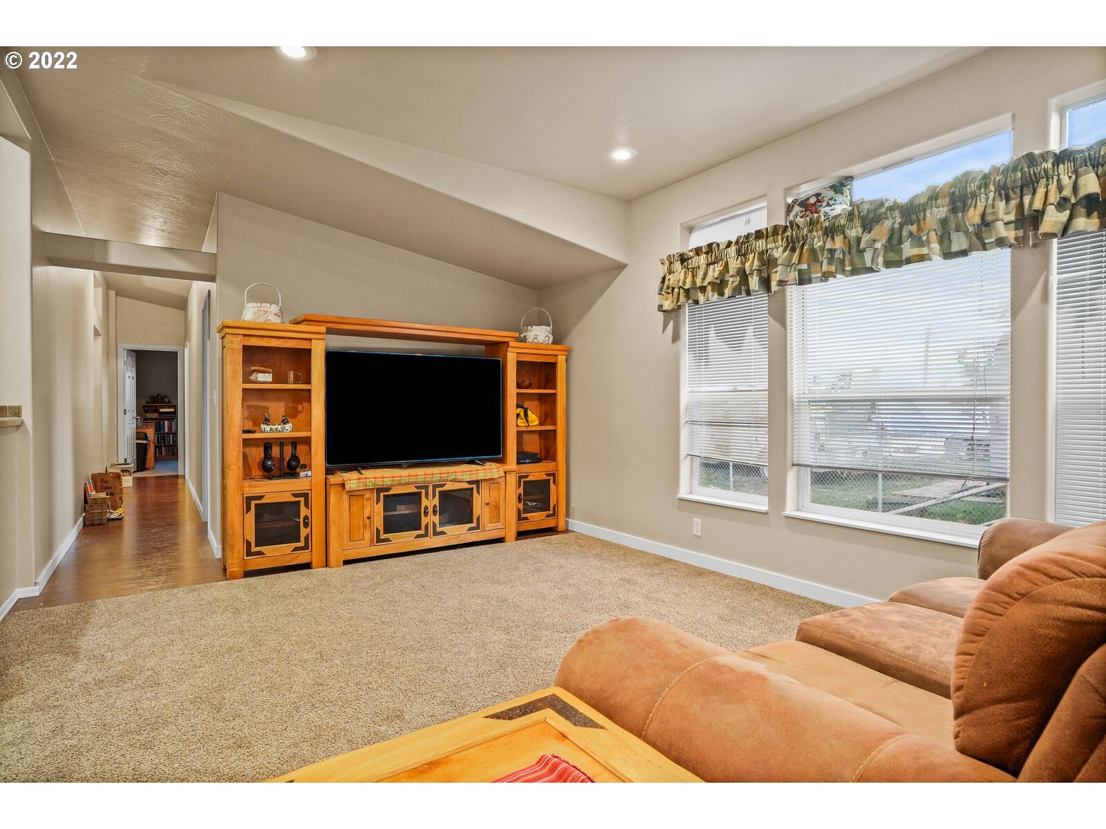 11005 Portland Road Northeast Salem, OR 97305 - Photo 13 of 32 a living room with furniture and a flat screen tv