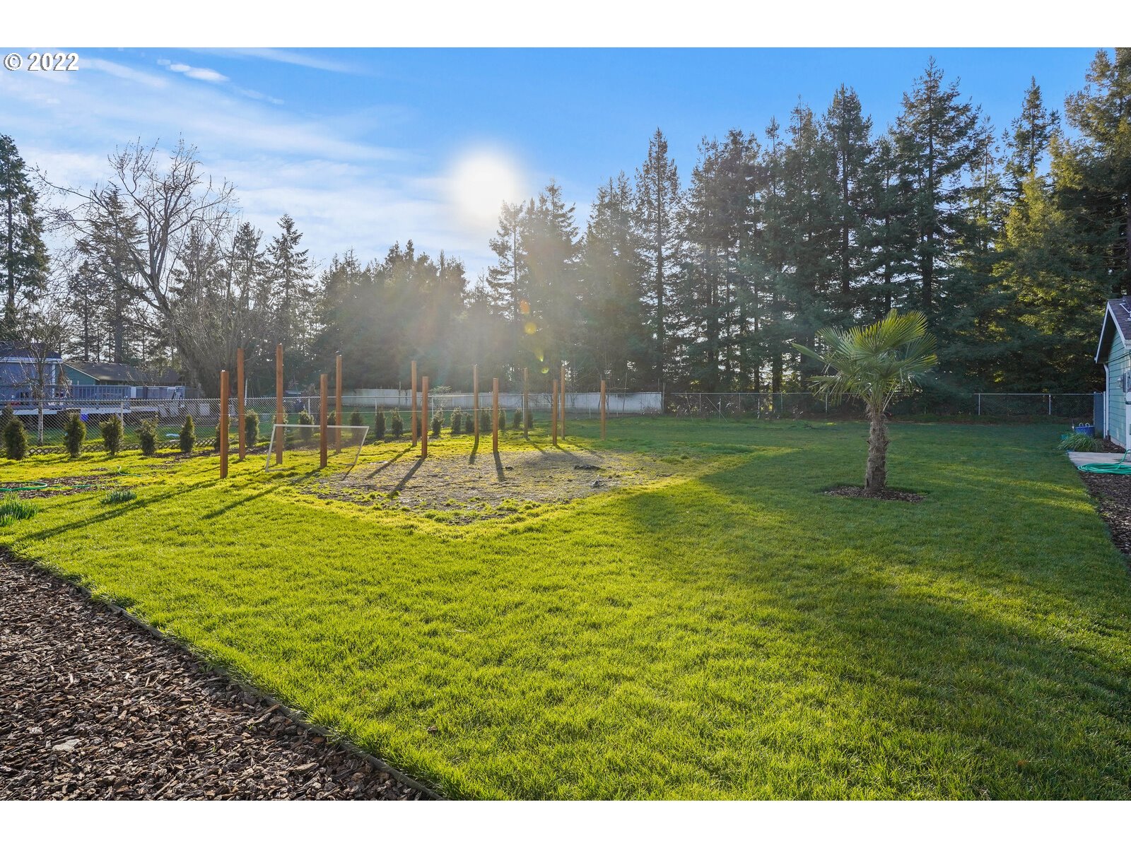 11005 Portland Road Northeast Salem, OR 97305 - Photo 31 of 32 a view of a swimming pool with an outdoor space and seating area