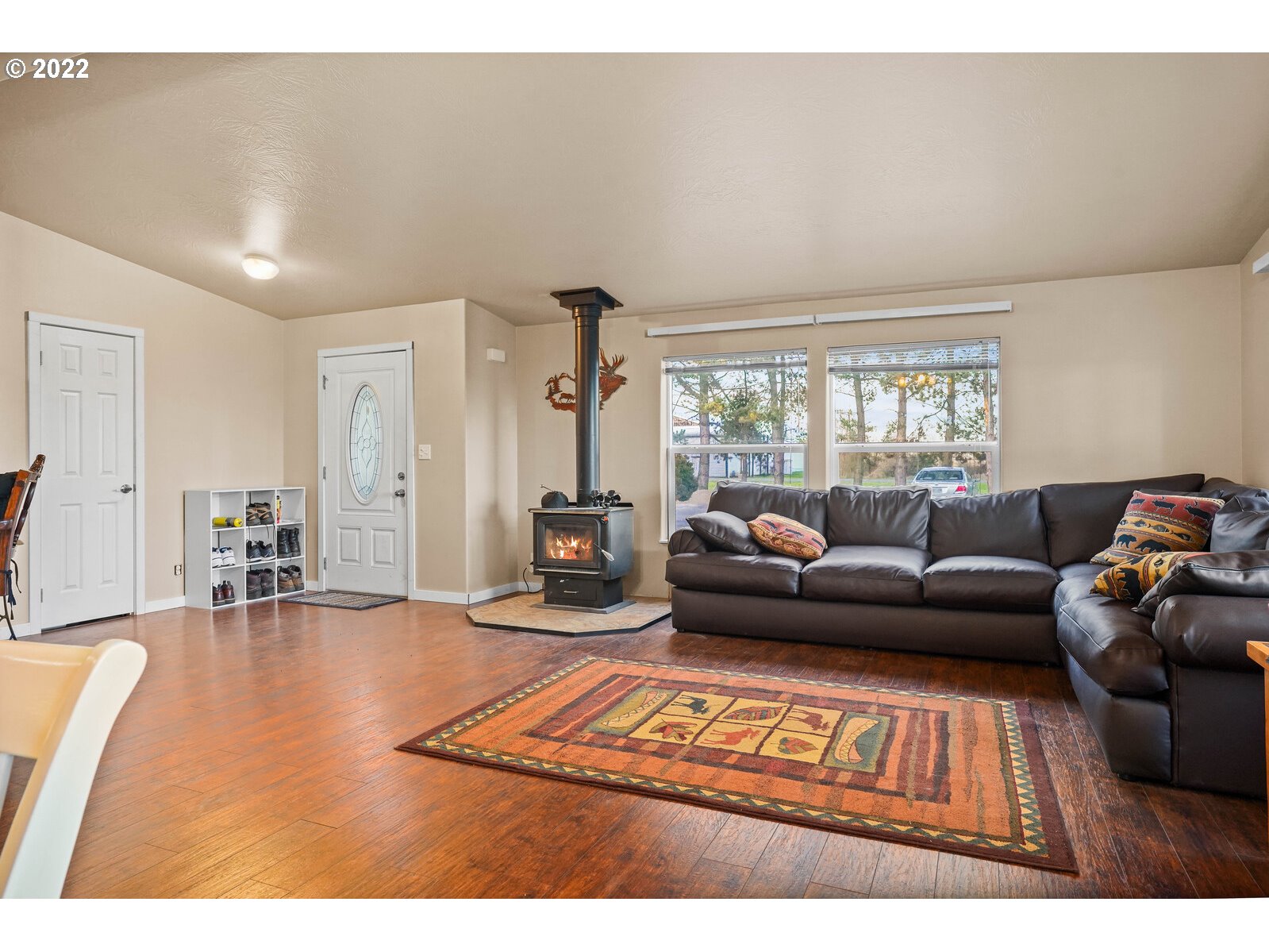 11005 Portland Road Northeast Salem, OR 97305 - Photo 4 of 32 a living room with furniture and a rug
