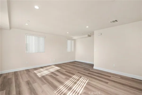 a view of kitchen with wooden floor