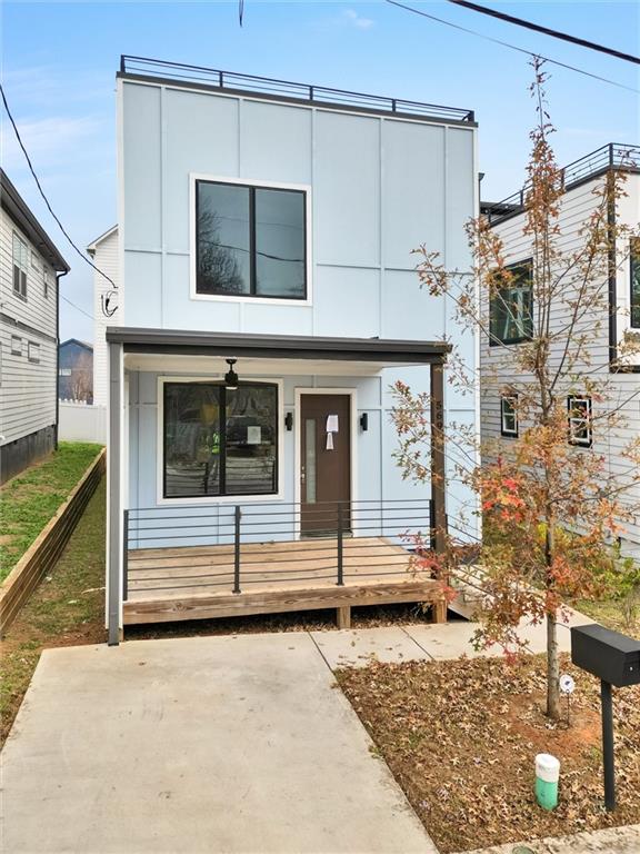 a view of a house with entrance gate