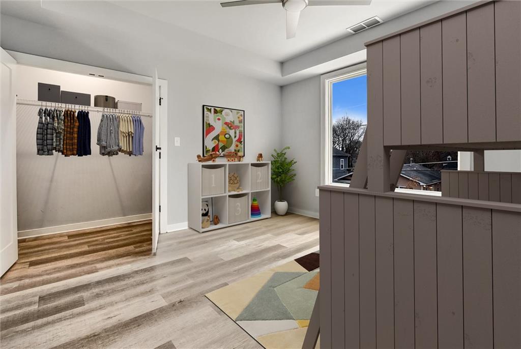 569 Middle Street Southwest Atlanta, GA 30310 - Photo 14 of 35 a view of a hallway with workspace and closet