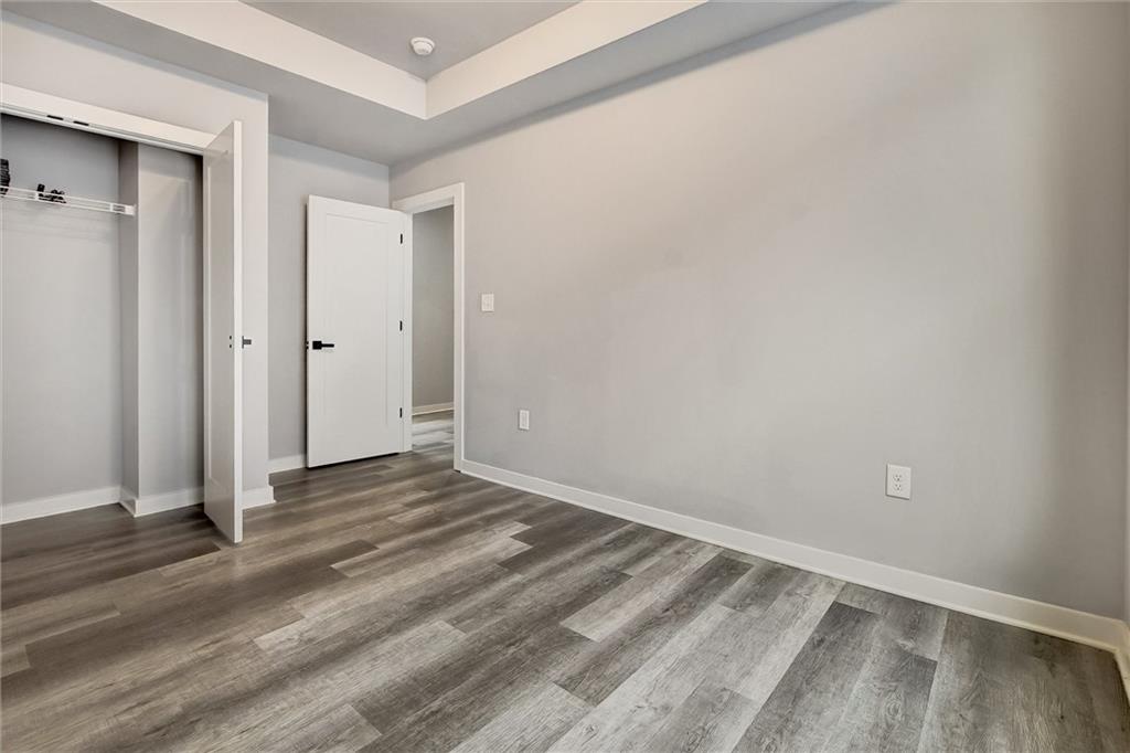 569 Middle Street Southwest Atlanta, GA 30310 - Photo 20 of 35 a view of an empty room and wooden floor