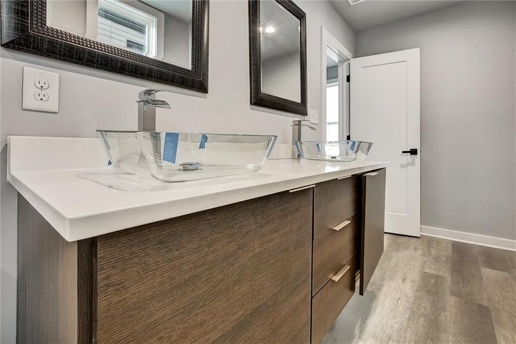 569 Middle Street Southwest Atlanta, GA 30310 - Photo 28 of 35 a bathroom with a sink and a mirror
