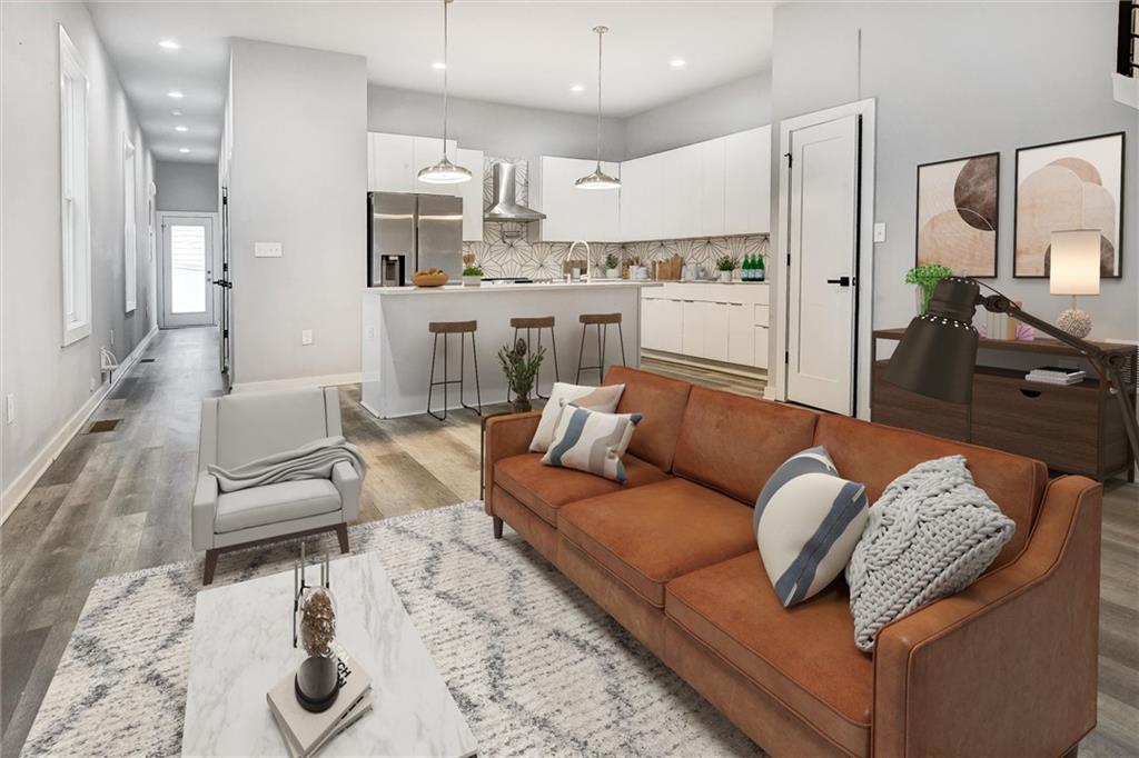 569 Middle Street Southwest Atlanta, GA 30310 - Photo 3 of 35 a living room with furniture and a large window