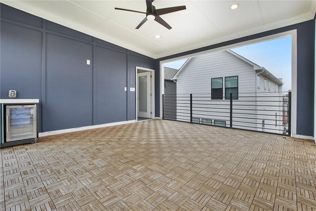 569 Middle Street Southwest Atlanta, GA 30310 - Photo 33 of 35 a view of a livingroom with a ceiling fan and window