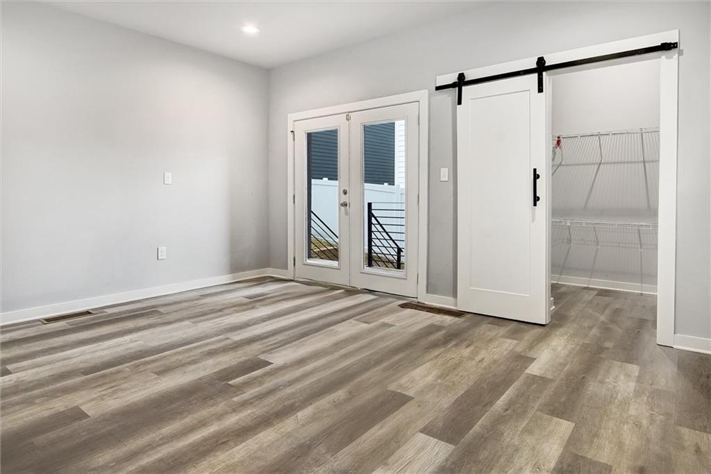 569 Middle Street Southwest Atlanta, GA 30310 - Photo 9 of 35 a view of a bathroom with a shower and closet