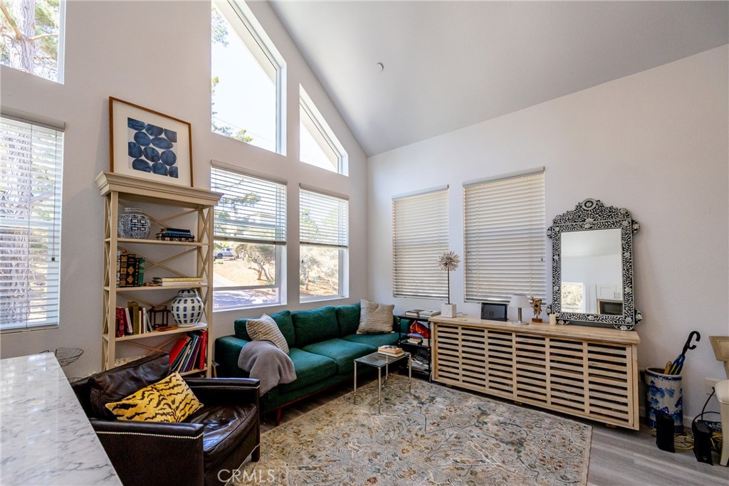 2070 Wales Road Cambria, CA 93428 - Photo 11 of 38 a living room with furniture and a window