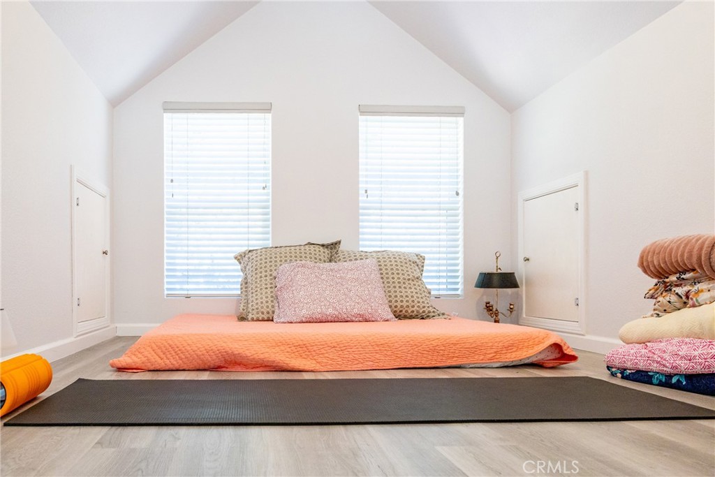 2070 Wales Road Cambria, CA 93428 - Photo 19 of 38 a bedroom with a bed and window