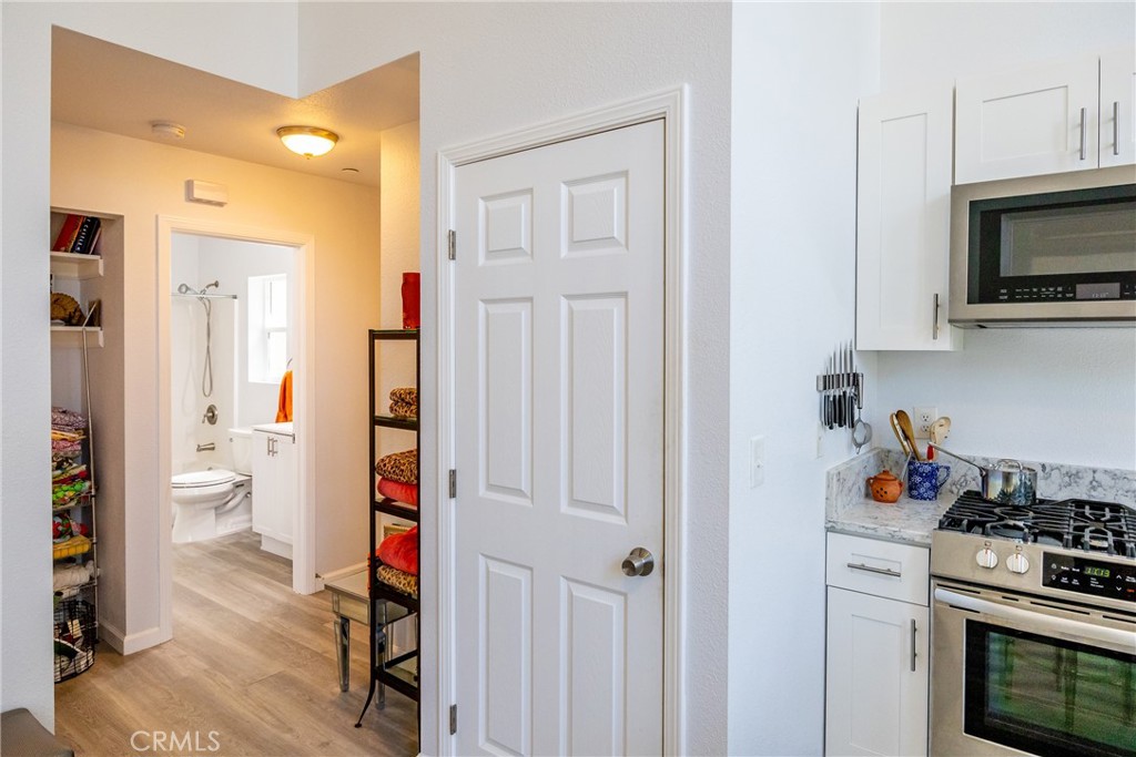 2070 Wales Road Cambria, CA 93428 - Photo 22 of 38 a kitchen with a stove and a microwave