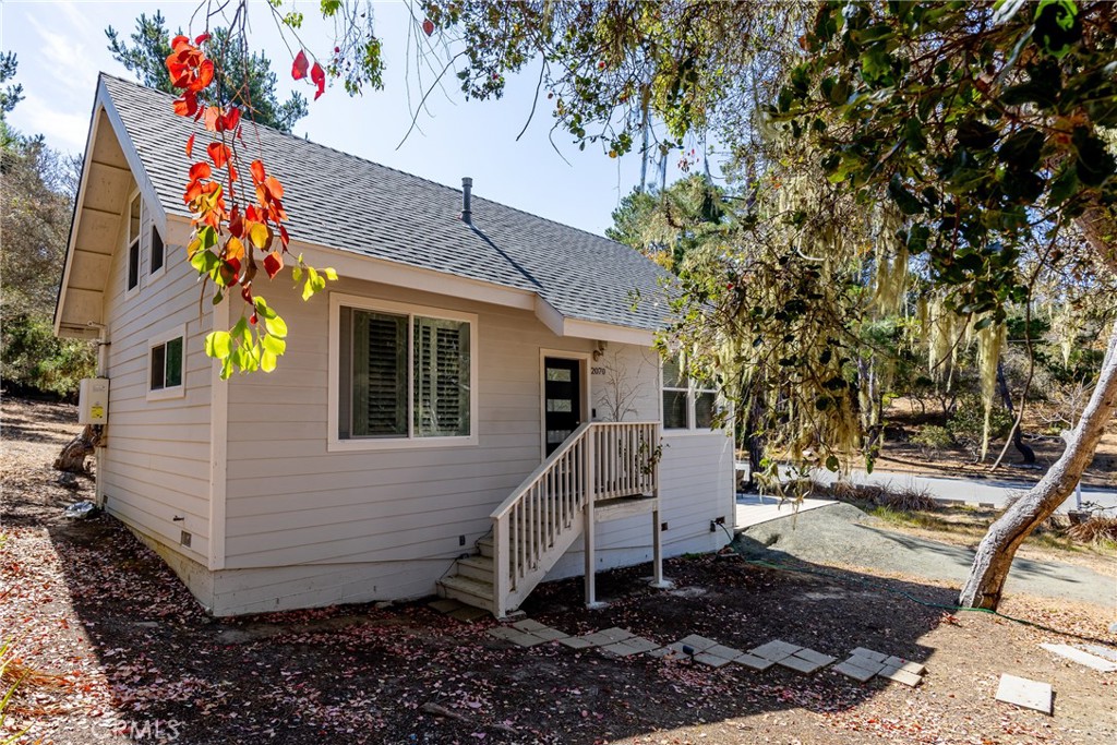 2070 Wales Road Cambria, CA 93428 - Photo 31 of 38 a house view with a backyard space