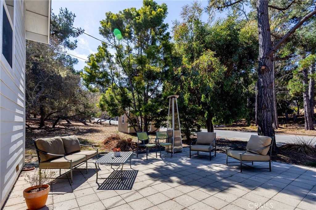 2070 Wales Road Cambria, CA 93428 - Photo 34 of 38 a view of a patio with swimming pool