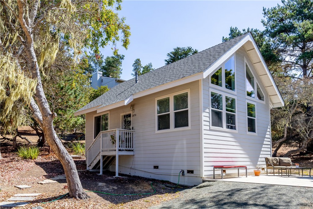 2070 Wales Road Cambria, CA 93428 - Photo 35 of 38 front view of house with a yard